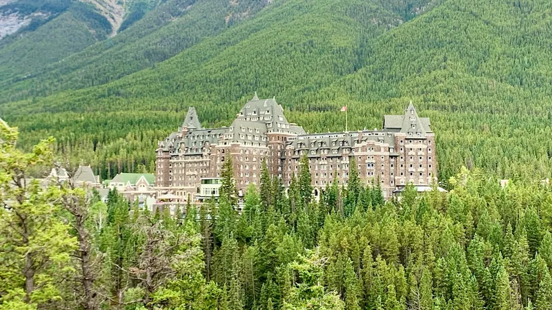 Fairmont Banff Springs in winter with snow-covered mountains
